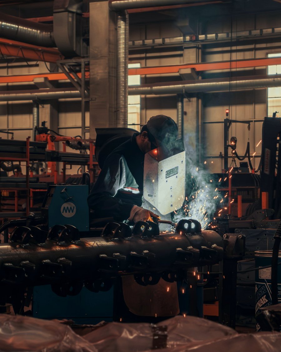 A welder at work in a fabrication shop