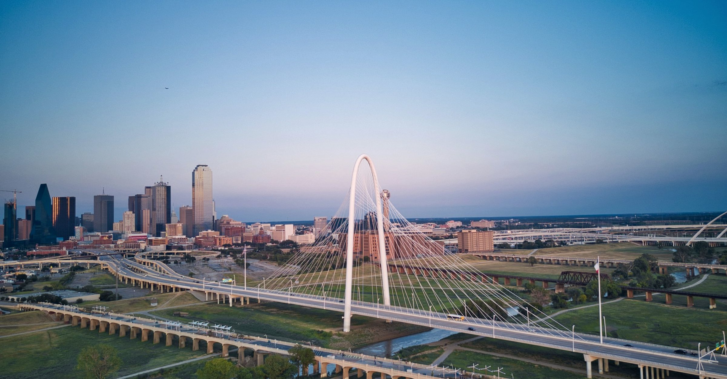 Downtown Dallas and the Margaret Hunt Hill Bridge at dusk